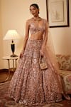Buy_Opus Atelier_Peach Tulle, Net Mirrors, Embroidery, Sequins V-neck Lehenga Set _at_Aza_Fashions