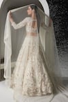 Shop_Opus Atelier_Ivory Tulle, Net Embroidery, Sequins, Beads, Tassels Light Valerie Lehenga Set _at_Aza_Fashions
