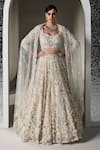 Buy_Opus Atelier_Ivory Tulle, Net Embroidery, Sequins, Beads, Tassels Light Valerie Lehenga Set _at_Aza_Fashions