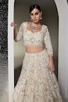 Shop_Opus Atelier_Ivory Tulle, Net Embroidery, Sequins, Beads, Tassels Light Valerie Lehenga Set _Online_at_Aza_Fashions