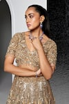 Opus Atelier_Gold Net, Satin, Tulle Embroidery, Sequins, Beads V-neck Ciara Lehenga Set _Online_at_Aza_Fashions