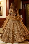 Shop_Opus Atelier_Gold Net, Satin, Tulle Sequins, Embroidery, Fabric Flowers, Marigold Lehenga Set _at_Aza_Fashions