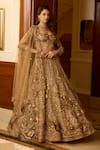 Shop_Opus Atelier_Gold Net, Satin, Tulle Sequins, Embroidery, Fabric Flowers, Marigold Lehenga Set _Online_at_Aza_Fashions