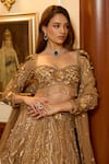 Opus Atelier_Gold Net, Satin, Tulle Sequins, Embroidery, Fabric Flowers, Marigold Lehenga Set _at_Aza_Fashions