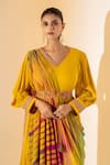 K-Anshika_Mustard Georgette Embroidery, Tassels V-neck Draped Gown And Leheriya Dupatta Set _Online_at_Aza_Fashions