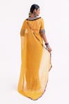 Shop_Garo_Mustard Chiffon, Silk Tassels, Embroidery Round Neck Tribal Blouse With Saree _at_Aza_Fashions