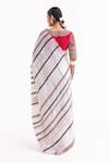 Shop_Garo_Off White Chanderi Embroidery Round Neck Stripe Pattern Saree With Blouse _at_Aza_Fashions