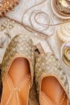 Shop_NR By Nidhi Rathi_Gold Embroidered Juttis _at_Aza_Fashions