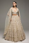 Buy_Opus Atelier_Beige Net, Tulle Embroidery, Sequins V-neck Marisol Lehenga Set _at_Aza_Fashions