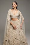 Buy_Opus Atelier_Beige Net, Tulle Embroidery, Sequins V-neck Marisol Lehenga Set _Online_at_Aza_Fashions