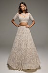 Shop_Opus Atelier_Beige Tulle, Net Embroidery, Sequins Sweetheart Neck Lacey Lehenga Set _at_Aza_Fashions
