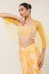 Libas Cafe by Nidhi & Ashish_Yellow Net, Crepe Pearls, Hand Embroidered Blouse And Printed Dhoti Skirt Set _Online_at_Aza_Fashions