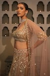 Libas Cafe by Nidhi & Ashish_Peach Net Zari, Sequins, Embroidery Square Neck Hand Lehenga Set _Online_at_Aza_Fashions