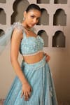 Libas Cafe by Nidhi & Ashish_Aqua Net, Lycra Sequins, Embroidery, Beads, Feathers Draped Blouse And Lehenga Set _Online_at_Aza_Fashions