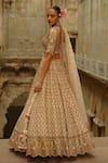 Shop_Nitika Gujral_Cream Silk, Organza Embroidery, Mirrors, Zari, Pearls, Hand Bridal Lehenga Set _Online_at_Aza_Fashions