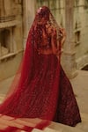 Nitika Gujral_Burgundy Net Beads, Sequins, Cut Work, Embroidery Halter Embellished Lehenga Set _Online_at_Aza_Fashions