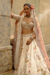 Nitika Gujral_Cream Silk, Organza Sequins, Gota Patti, Zari, Pearls, Raw Work Lehenga Set _at_Aza_Fashions