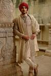 Nitika Gujral_Gold Brocade, Cotton, Silk Embroidery, Beads, Zari Floral Sherwani Set _at_Aza_Fashions