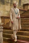 Shop_Nitika Gujral_Cream Taffeta, Silk, Cotton Metallic Thread, Embroidery, Floral Sherwani Set _Online_at_Aza_Fashions
