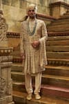 Buy_Nitika Gujral_Cream Taffeta, Silk, Cotton, Georgette Embroidery, Beads, Floral Sherwani Set _at_Aza_Fashions