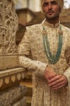 Shop_Nitika Gujral_Cream Taffeta, Silk, Cotton, Georgette Embroidery, Beads, Floral Sherwani Set _Online_at_Aza_Fashions
