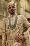Nitika Gujral_Cream Taffeta, Silk, Cotton, Georgette Embroidery, Beads, Floral Sherwani Set _at_Aza_Fashions