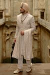Shop_Nitika Gujral_Beige Silk, Cotton, Chanderi Embroidery, Beads Motif Sherwani Set _Online_at_Aza_Fashions