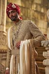 Nitika Gujral_Gold Dupion, Silk, Cotton Embroidery, Metallic Thread, Motif Sherwani Set _at_Aza_Fashions