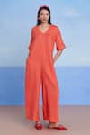 Buy_Saphed_Orange Linen V-neck Tangerine Half Sleeves Flared Jumpsuit _at_Aza_Fashions