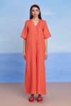 Buy_Saphed_Orange Linen V-neck Tangerine Half Sleeves Flared Jumpsuit _Online_at_Aza_Fashions