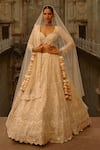 Buy_Nitika Gujral_Ivory Net Embroidery, Sequins, Crystals, Pearls, Embellished Bridal Lehenga Set _at_Aza_Fashions