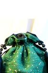 Shop_Mid July Home_Emerald Green Sequins, Tassels, Beads Embroidered Potli Bag _at_Aza_Fashions