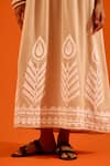 Indian Summer Story_Beige Embroidery, Pom-poms V-neck Petal Thread Dress _at_Aza_Fashions