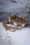 Buy_Vivinia By Vidhi Mehra_Gold Plated Stones, Rhinestones Asymmetric Embellished Bangles _at_Aza_Fashions