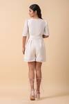 Shop_Naintara Bajaj_White Rayon V-neck Ivory Playsuit _at_Aza_Fashions