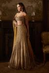 Shop_Seema Gujral_Gold Net Sequins, Beads, Crystals Off-shoulder Antqiue Trail Skirt Set _Online_at_Aza_Fashions