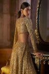 Seema Gujral_Gold Net Crystals, Beads, Sequins, Embroidery, Tassels Tonal Slit Skirt Set _Online_at_Aza_Fashions