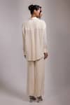 Shop_Yoseba_Ivory Crepe Beads, Tassels Collared Kaddana Shirt And Pant Set _at_Aza_Fashions