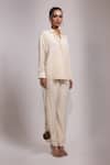 Yoseba_Ivory Crepe Beads, Tassels Collared Kaddana Shirt And Pant Set _Online_at_Aza_Fashions