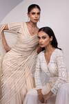 Yoseba_Ivory Net, Modal, Satin Embroidery, Sequins Pre-draped Skirt Saree With Blouse _at_Aza_Fashions