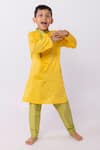 Buy Minikin Yellow Cotton, Silk Embroidery Lotus Kurta Set at Aza Fashions Buy_Minikin_Yellow Cotton, Silk Embroidery Lotus Kurta Set _at_Aza_Fashions