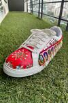 Buy_Modanta Footwear_Red Mirror And Cowrie Shell Embellished Sneakers _at_Aza_Fashions