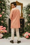 Shop_Vaani Beswal_Peach Cotton Carl Asymmetric Pleated Panel Kurta _at_Aza_Fashions