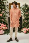 Buy_Vaani Beswal_Peach Cotton Carl Asymmetric Pleated Panel Kurta _at_Aza_Fashions