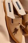 Shradha Hedau Footwear Couture_Beige Zana Tassel Detail Pointed Toe Mules _at_Aza_Fashions