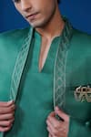 Shop_Philocaly_Emerald Green Linen, Satin Embroidery, Brooches Vishruta Shawl Lapel Bandhgala _Online_at_Aza_Fashions