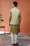 Shop_Philocaly_Olive Green Silk Kirit Pintucks Panelled Low-high Hem Bundi _at_Aza_Fashions