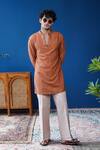 Buy_Philocaly_Orange Silk Zari Noora Textured V-neck Kurta With Dabka Collar _at_Aza_Fashions