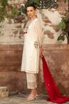 Amoree india_Ivory Cotton Embroidery, Tassels V-neck Floral Pattern Kurta Set _at_Aza_Fashions