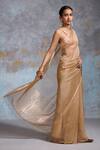 Buy Dressfolk Gold Organza Zari Arista Pre-draped Saree With Unstitched Blouse Piece at Aza Fashions Buy_Dressfolk_Gold Organza Zari Arista Pre-draped Saree With Unstitched Blouse Piece_at_Aza_Fashions